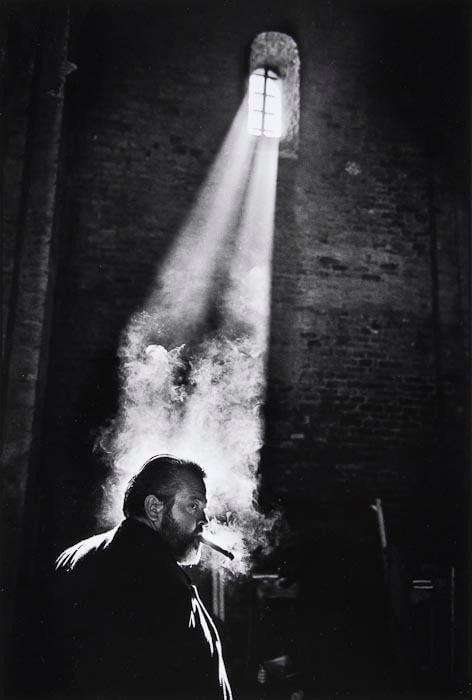 image showing Stunning photo of Orson Welles smoking a cigar - the light is fantastic.
