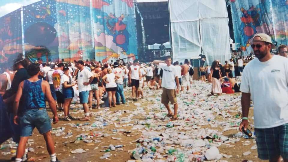 image showing [oc] Woodstock '99. me posing amongst the tons of litter