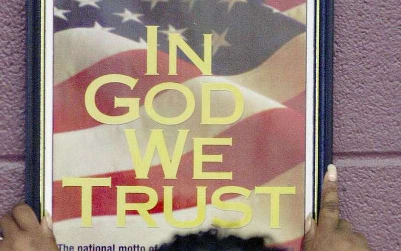 image for Florida activist wants to donate Arabic ‘In God We Trust’ signs to Texas schools