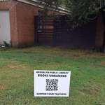 image for [OC] These are popping up all over after state fired a teacher for sharing a library QR code