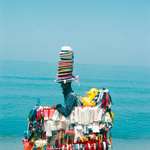 image for ITAP of someone selling hats and other things on a beach in Agropoli, Italy