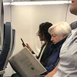 image for US Treasury Secretary Janet Yellen sitting in economy on a flight