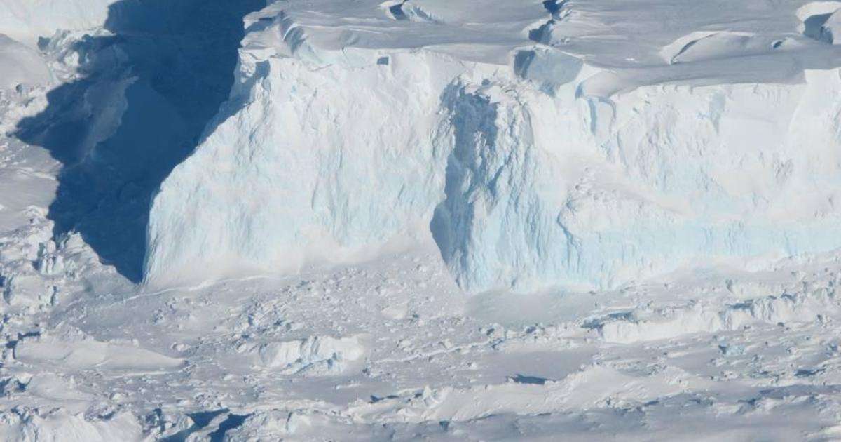 image for Antarctica's "doomsday glacier" could raise global sea levels by 10 feet. Scientists say it's "holding on today by its fingernails."