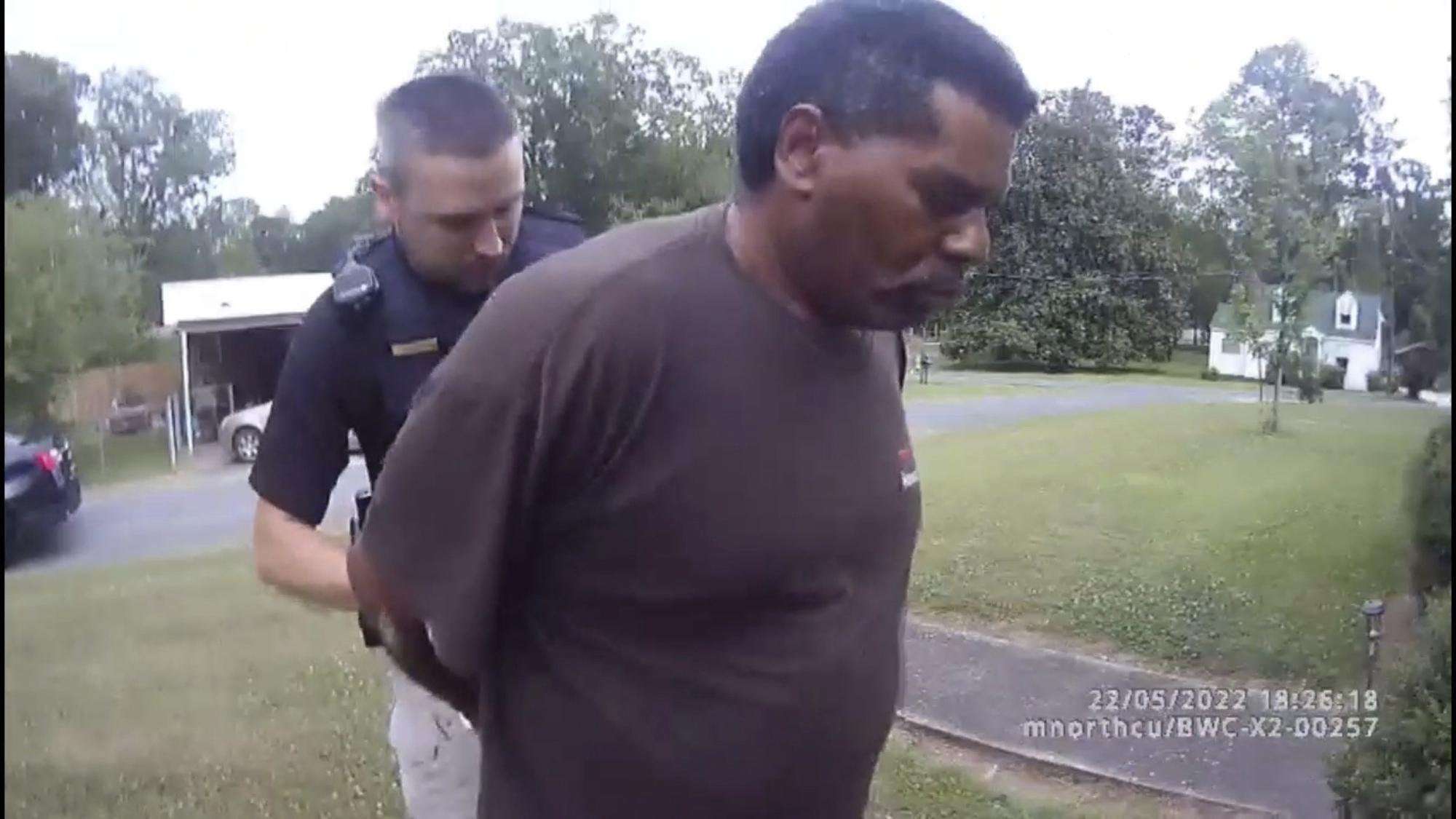 image for Black preacher arrested while watering flowers sues police