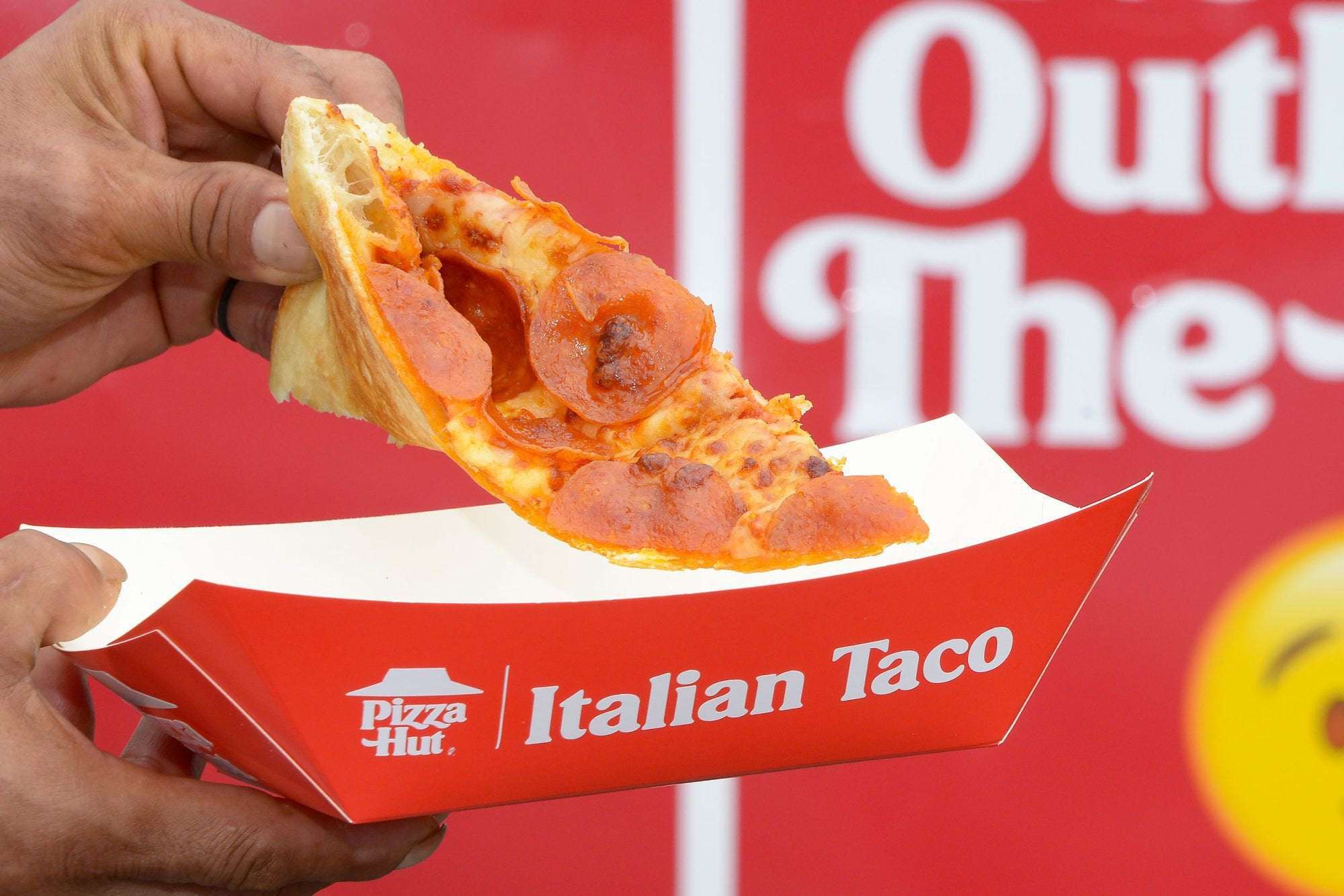 image for Pizza Hut Invents 'Italian Taco' to Take on Taco Bell's Mexican Pizza