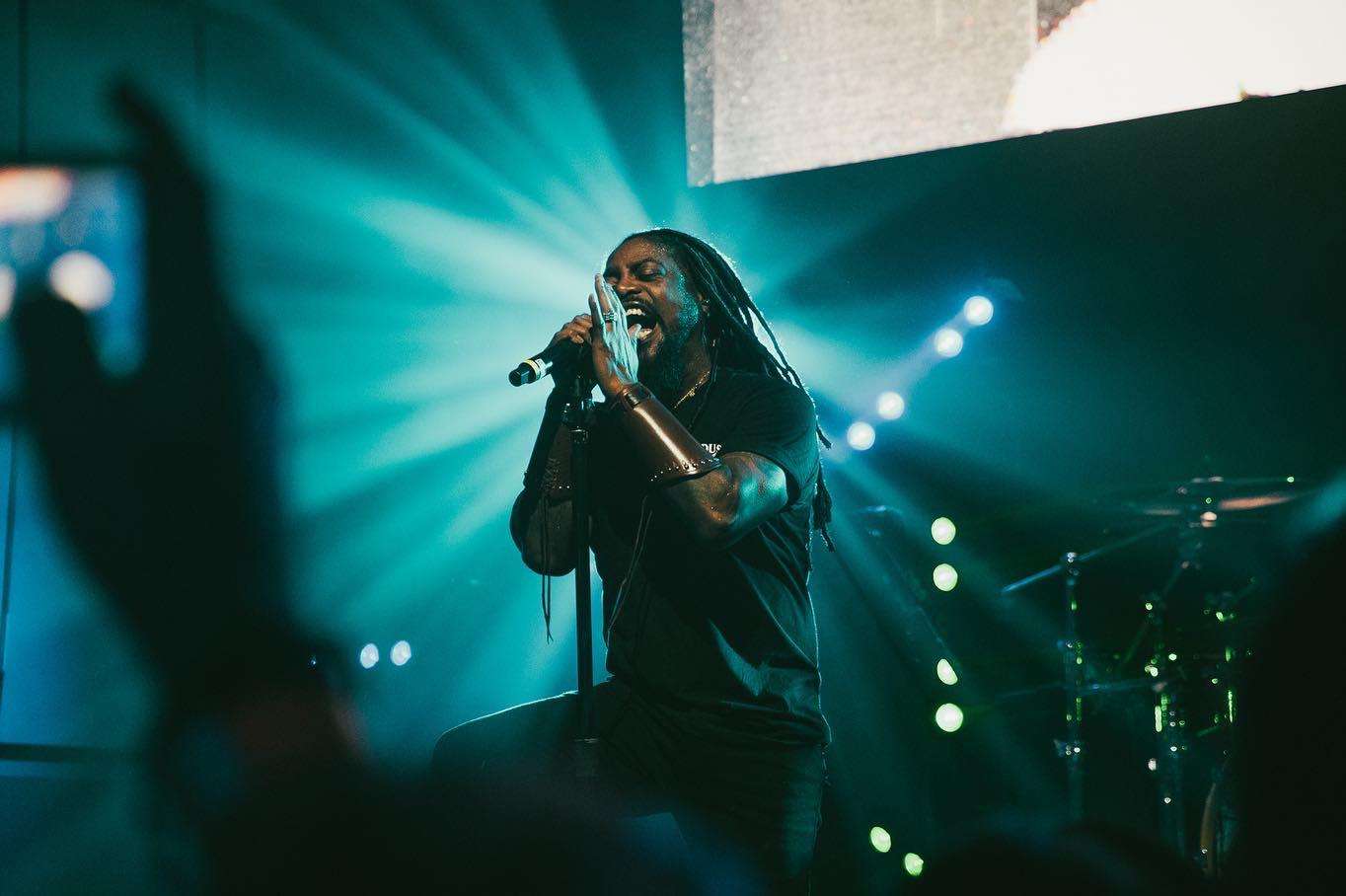 image showing ITAP of the lead singer of Sevendust