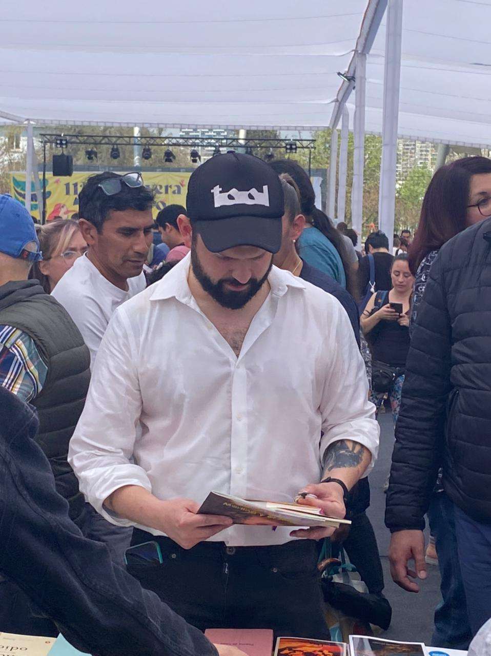 image showing The president of Chile attending a book fair today.