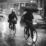 image for ITAP of some people cycling in the rain