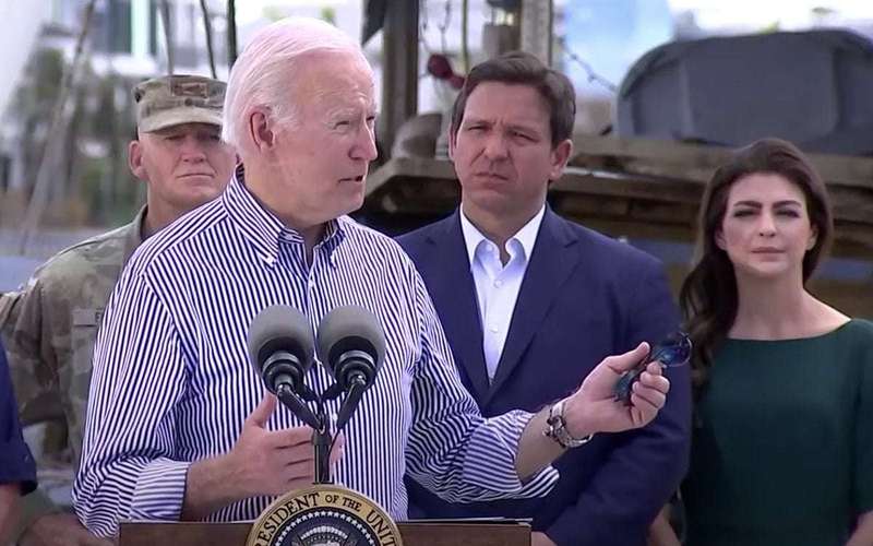 image for Biden says Hurricane Ian ‘ends discussion’ over climate change as DeSantis looks on