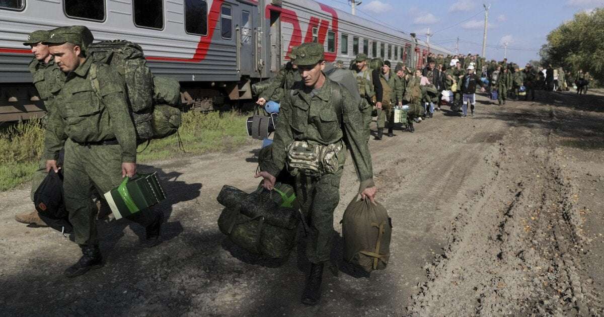 image for Russian troops pour into Belarus ‘by the trainload’