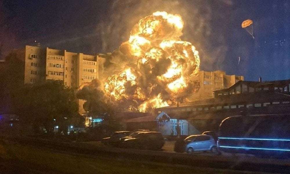 image for Military plane crashes into apartment building in western Russia