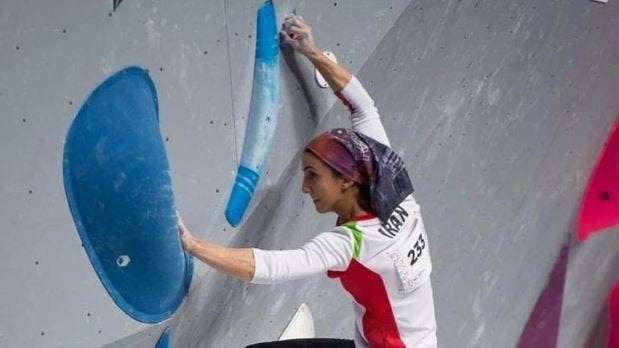 image for Iranian rock climber Elnaz Rekabi cheered as she returns to Tehran after explaining her hijab 'inadvertently' fell off during competition in South Korea