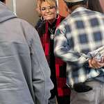 image for Sarah Palin wearing an Iron Cross at the Alaska Federation of Natives today