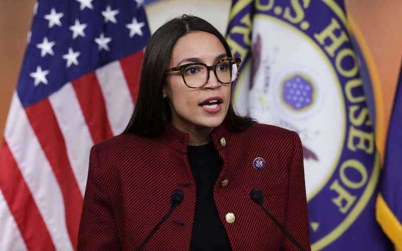 image for AOC says the US is 'truly facing an environment of fascism' where voter intimidation 'brings us to Jim Crow'