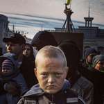 image for Photo of Ukrainian boy who lived through Russian occupation.
