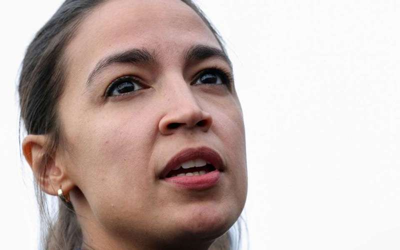image for AOC responds to Elon Musk's poll to reinstate Trump's Twitter, saying the 'last time he was here this platform was used to incite an insurrection'