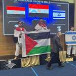 image for Both Egyptians contestants raising Palestinian flag against their Israeli contender.