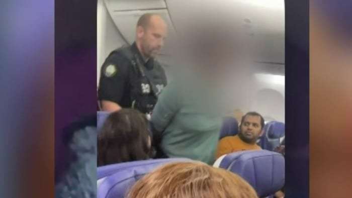 image for ‘Jesus told her to open the plane door’: Woman flying from Houston bit someone on flight in effort to open plane door at 37,000 feet, doc says