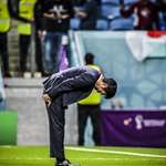 image for Japan team manager Hajime Moriyasu bows to the fans after losing against Croatia in World Cup 2022.