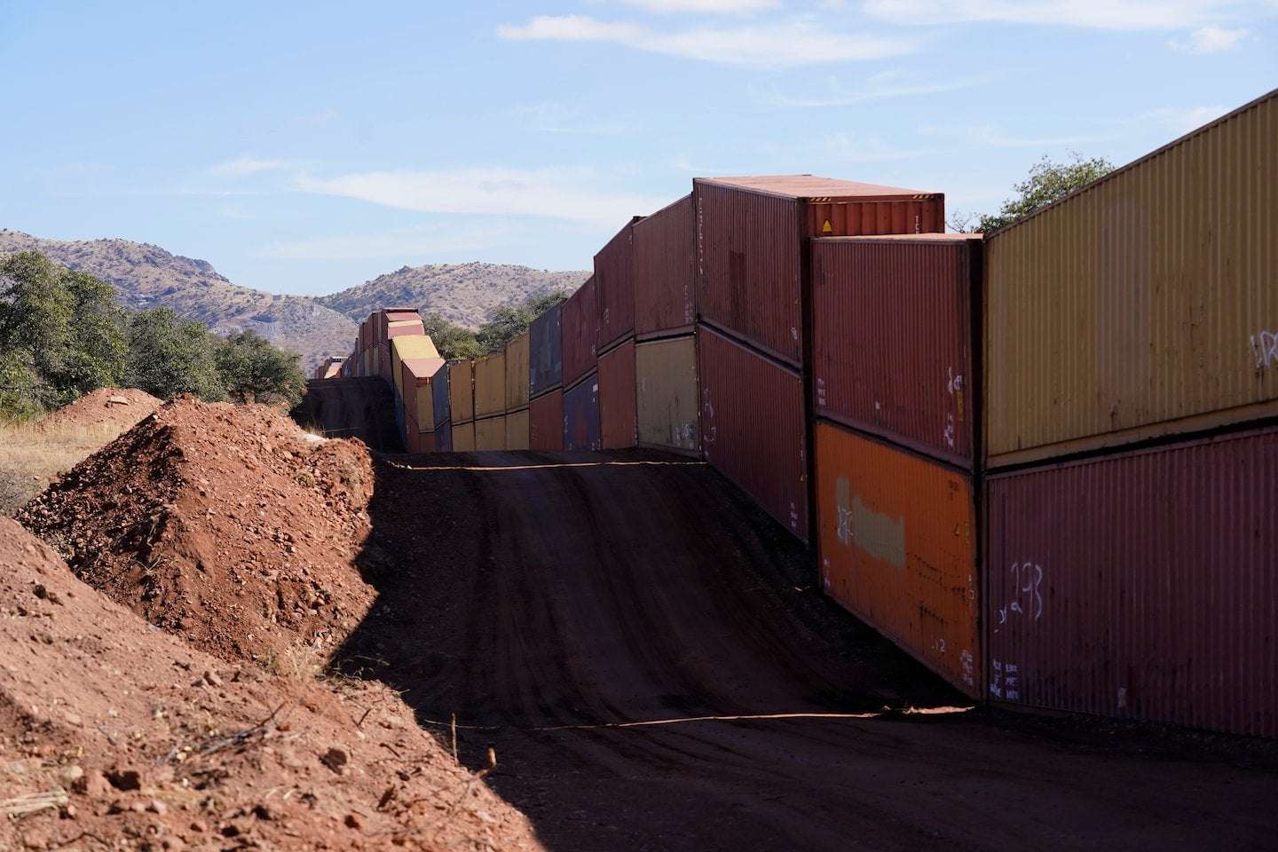 image for Arizona Gov. Ducey stacks containers on border at term's end