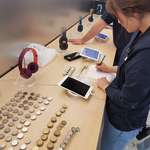image for Buying an iPad in the Apple store with hundreds of dollars in coins