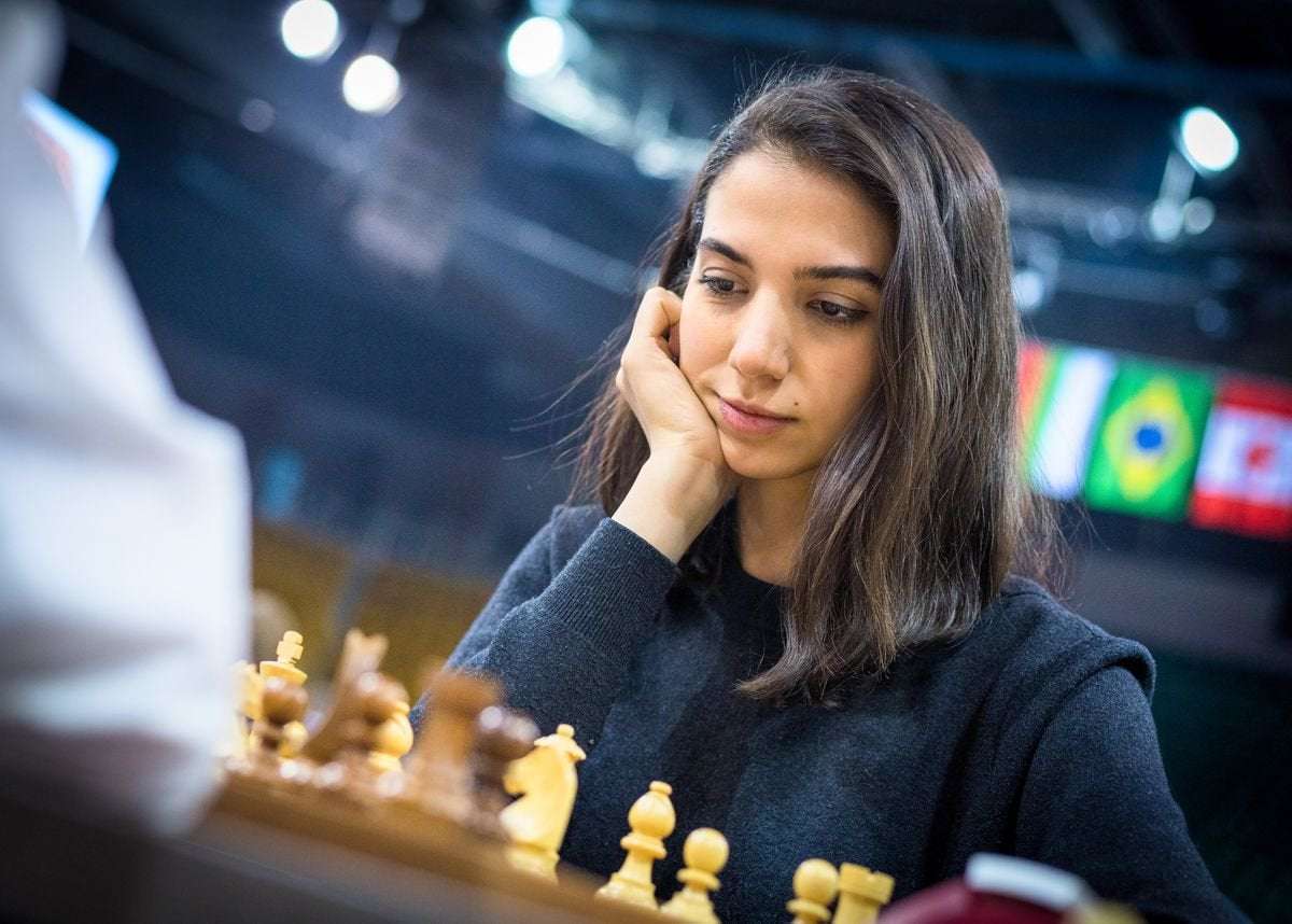image for After playing without a hijab in a world championship, Iranian chess star defects to Spain
