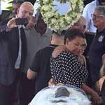 image for FIFA president Gianni Infantino taking a selfie in front of Pelé's open casket