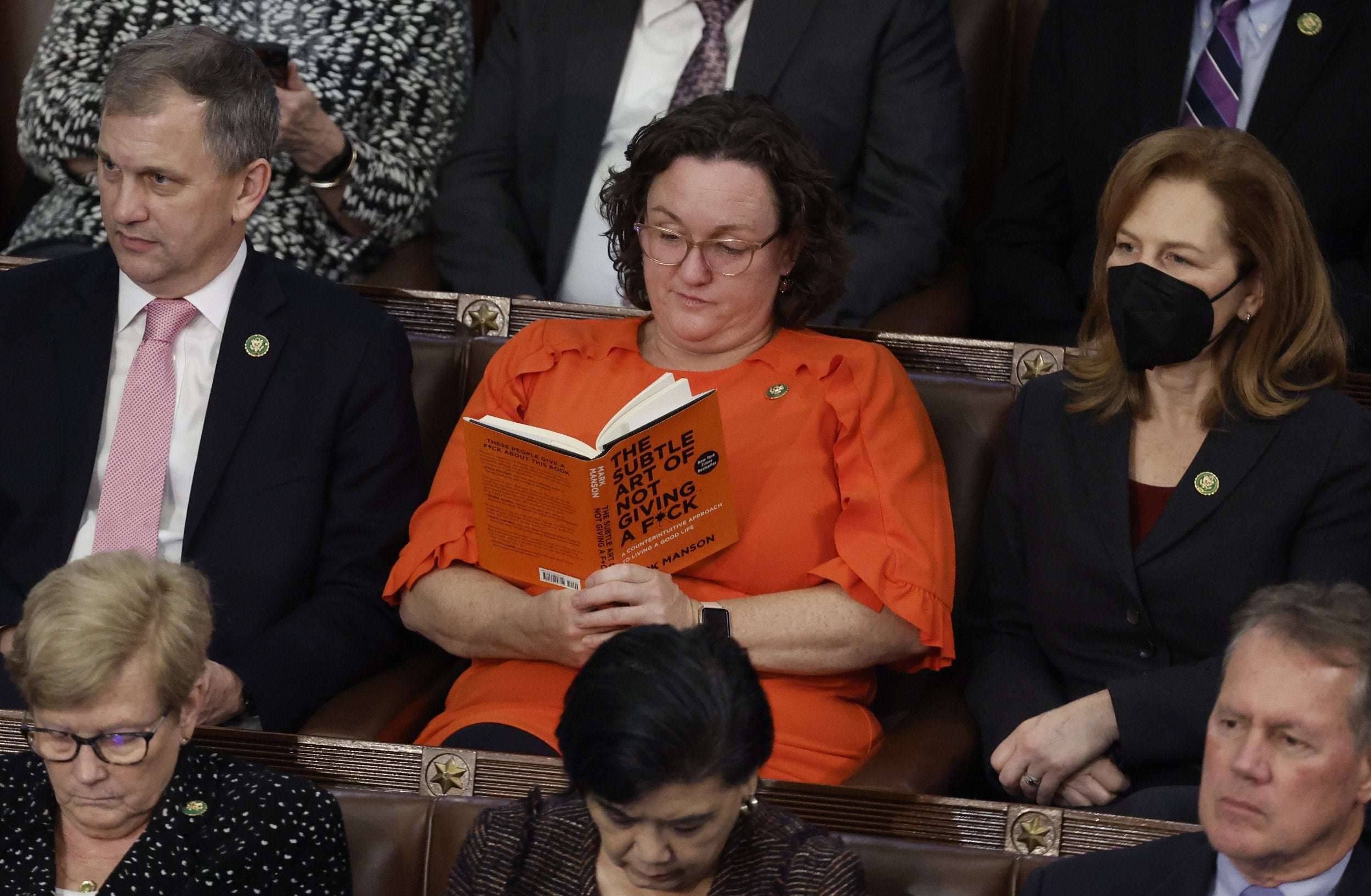 image for Katie Porter Goes Viral for Reading This Book During Chaotic Speaker Fight
