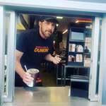 image for Ben Affleck working the drive-thru window at Dunkin in Medford, MA today