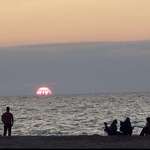 image for Chicago skyline visible from nearly 50 miles away in Indiana Dunes sunset.