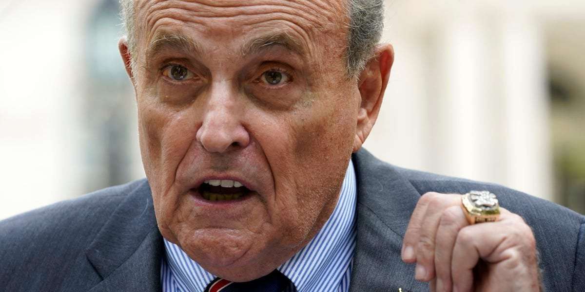 image for Rudy Giuliani says Trump once advised him to take top-secret files home