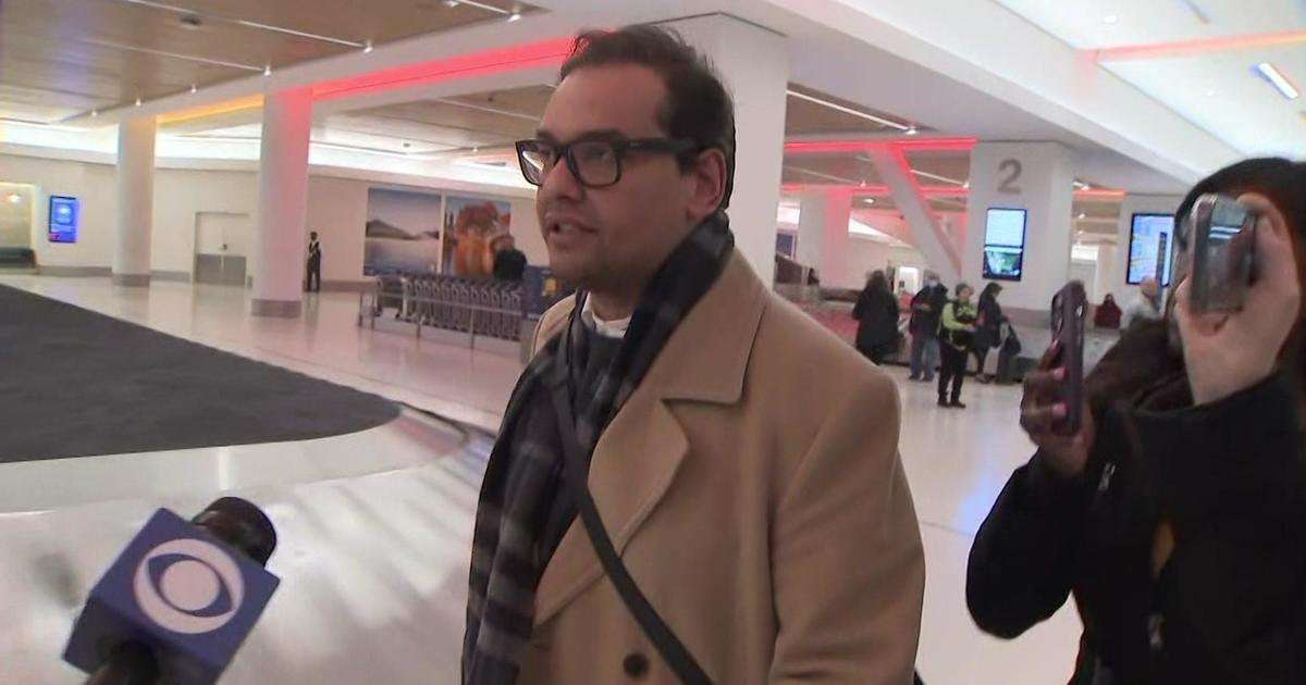 image for Embattled Rep. George Santos heckled after landing at LaGuardia Airport