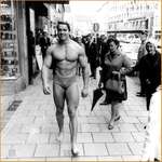 image for Arnold Schwarzenegger Walking Through Munich in Swimming Trunks in Order to Promote His Own Gym 1967