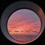 image for ITAP of sunset at sea from my cabin porthole