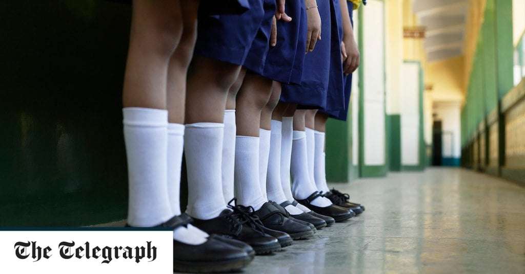 image for School that banned skirts forced to close as outraged students refuse to attend classes