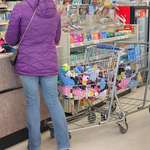 image for I just saw this woman buy two carts full of socks to donate to a local homeless shelter.