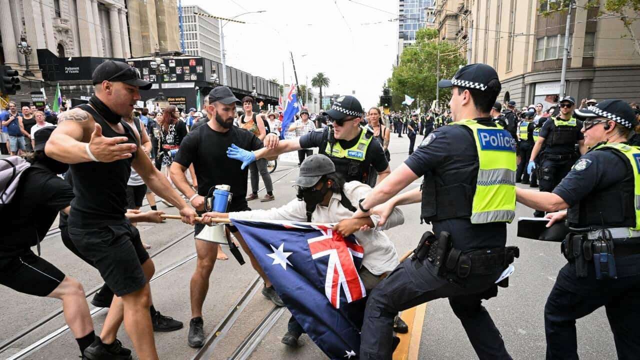 image for Nazi salutes performed on steps of Victorian parliament as protesters clash over trans rights