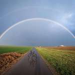image for I was riding my bike under a rainbow through a shower