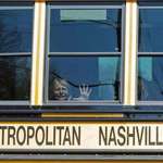 image for Deeply distressed elementary school student being transported by bus following school shooting