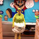 image for My Mom, who designed a Mario themed party at her office (all by hand) dressed as Cloud guy!