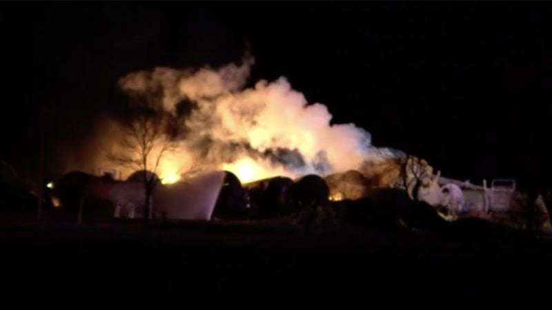 image for Raymond, Minnesota, train derailment: Cars carrying ethanol rupture and ignite. Now 4 more cars with highly flammable material could spill