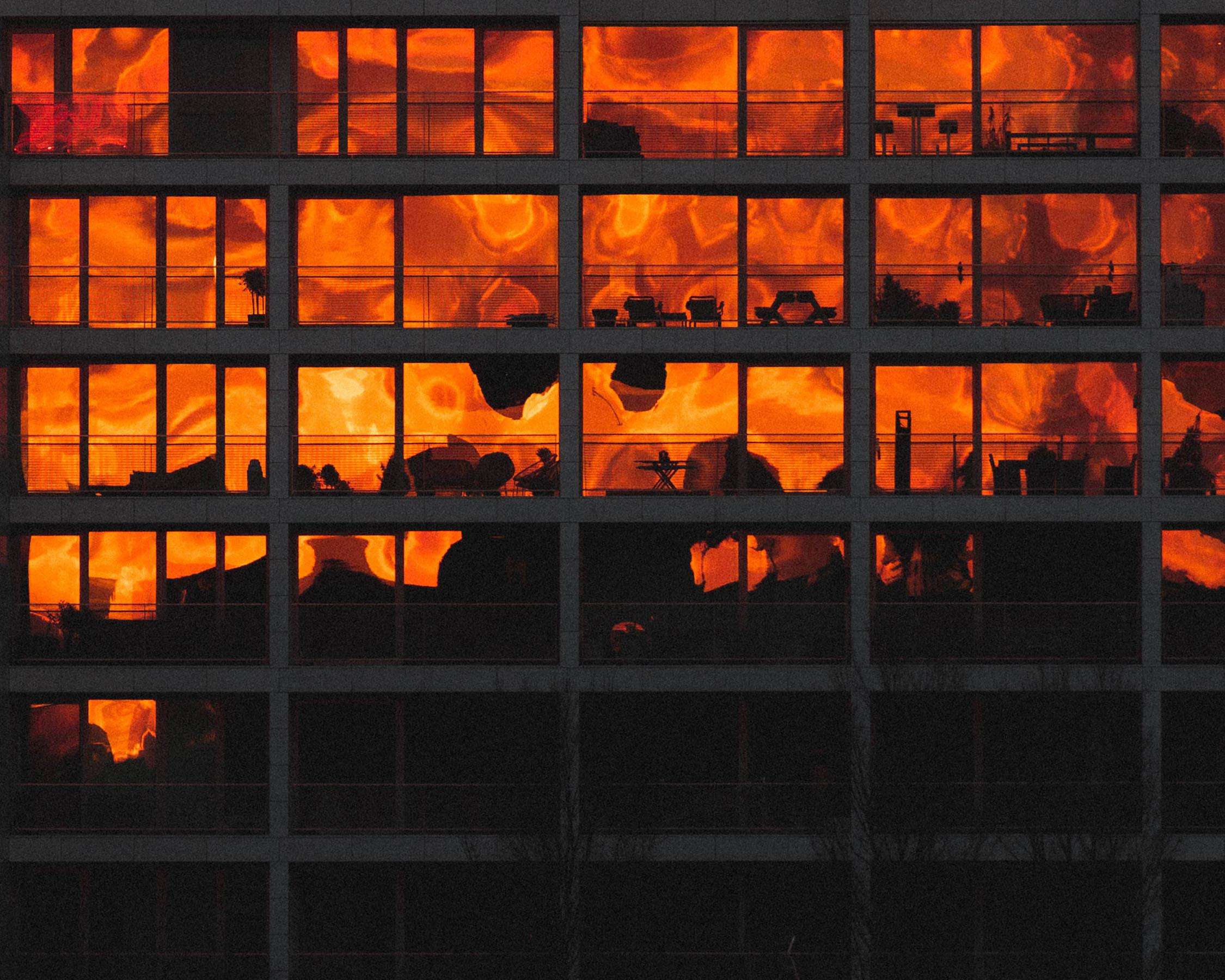 image showing ITAP of the sunset reflecting in a block of flats