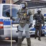 image for A German police officer wears a chain mail suit to deter knife attacks
