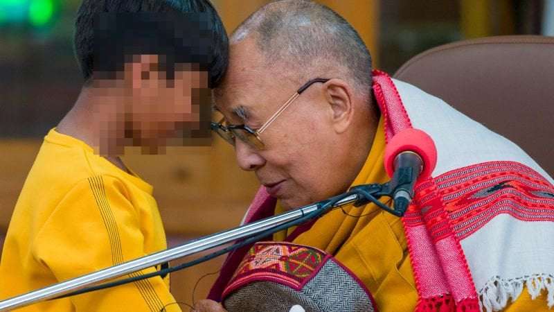 image for Dalai Lama apologizes after video kissing a boy on the lips and asking him to 'suck' his tongue
