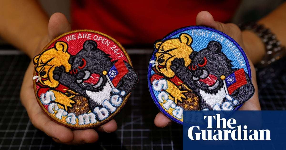 image for Taiwan: jump in sales for air force badges showing bear punching Winnie-the-Pooh