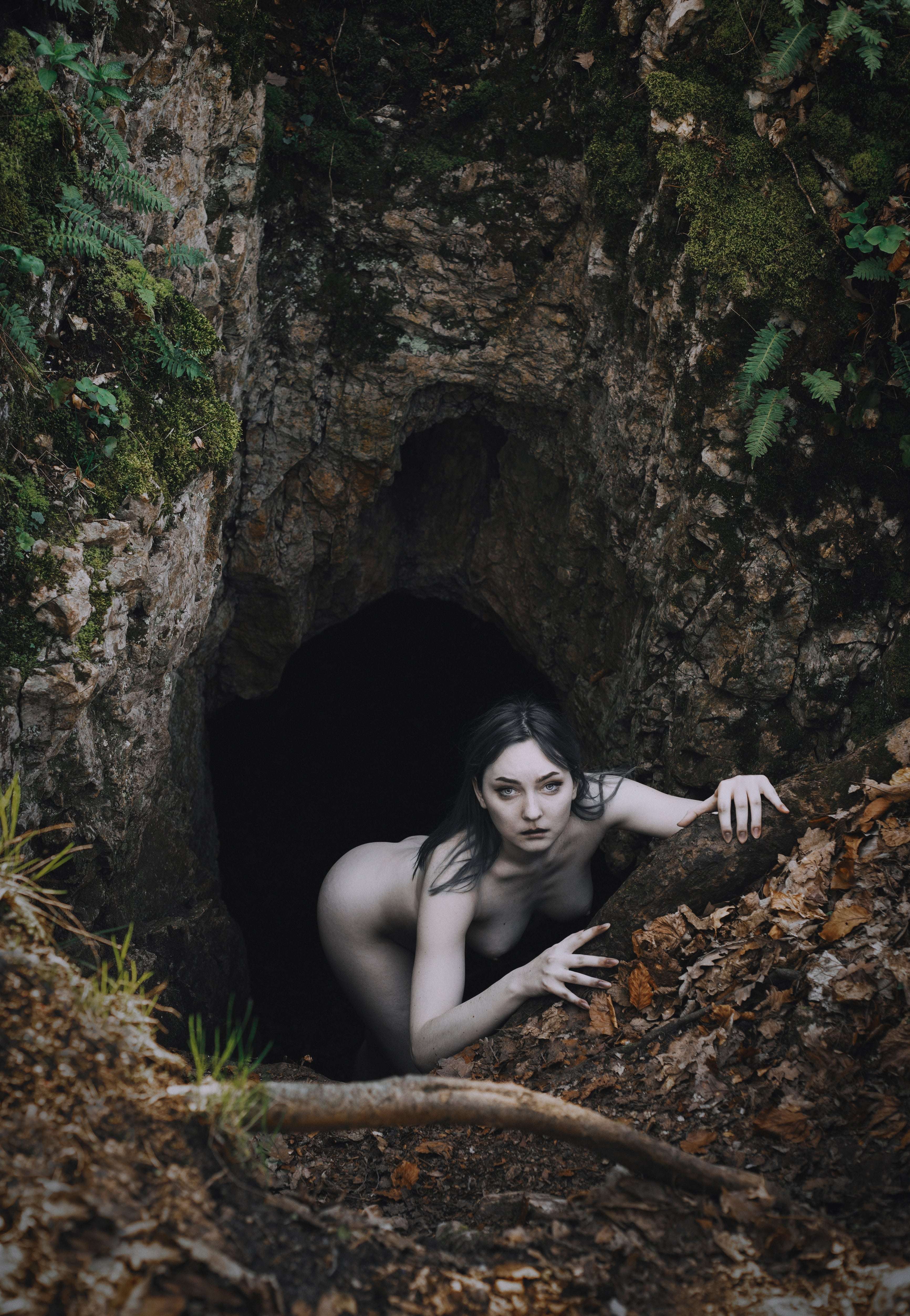image showing ITAP of myself crawling out of a cave [Portrait].