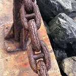 image for This metal chain is so old and rusted that it looks like it's made of wood!