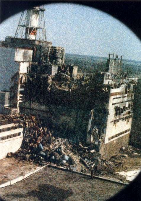 image showing The first photo of the Chernobyl plant, taken by by Igor Kostin 14 hours after the explosion.