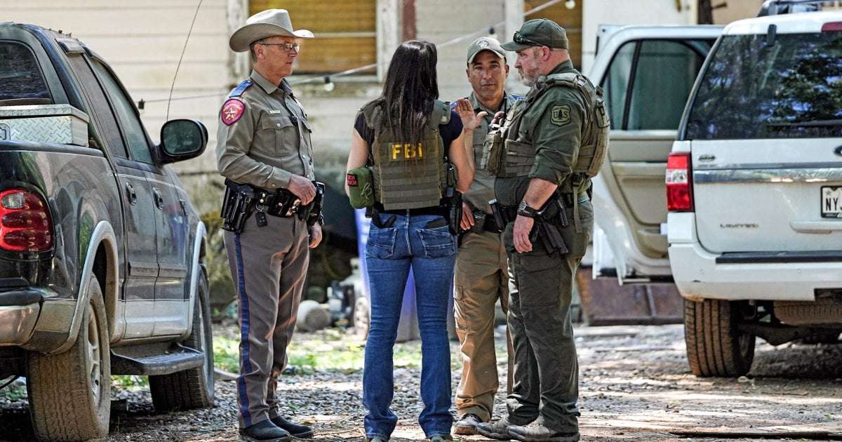 image for Texas manhunt ends after suspect accused of killing 5 neighbors found hiding in laundry pile