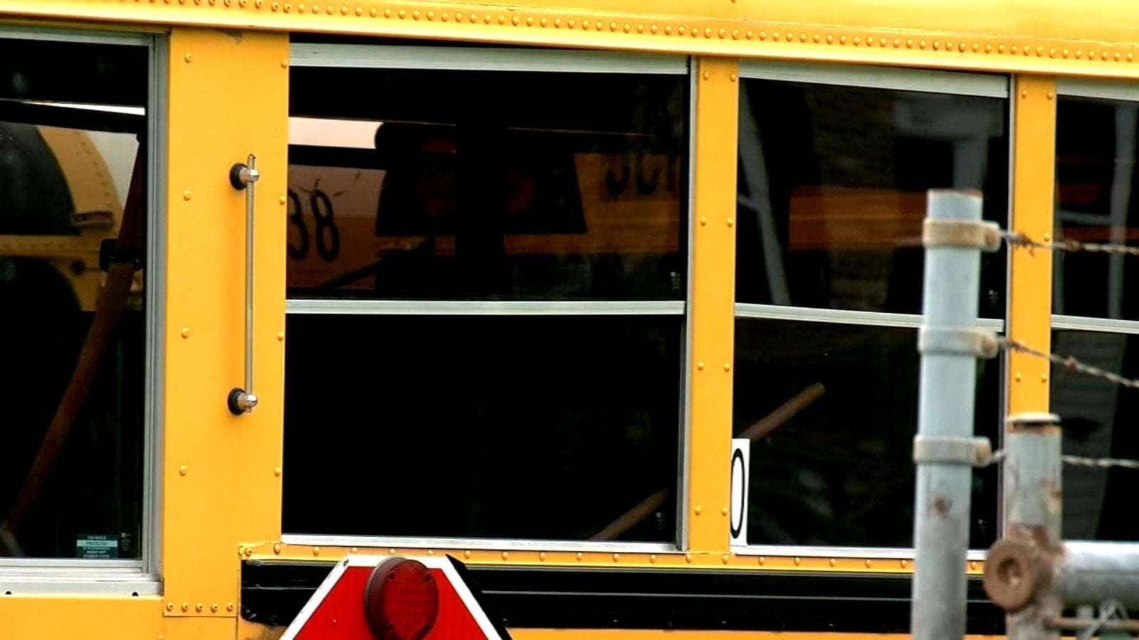 image for 3 masked teens jump on school bus, shoot at 14-year-old boy's head, beat him after gun misfires